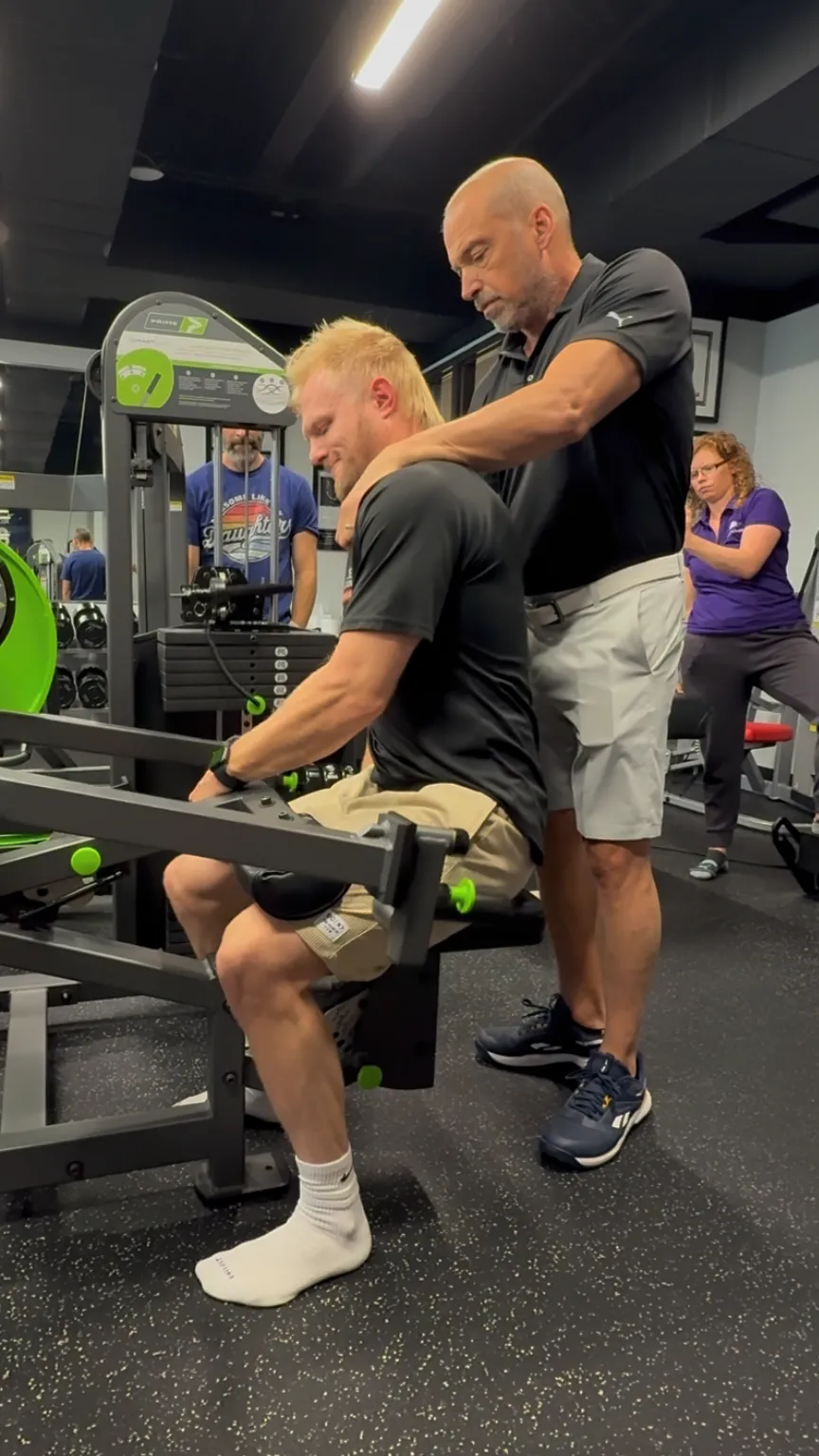 MAT practitioner assessing a client's muscular response