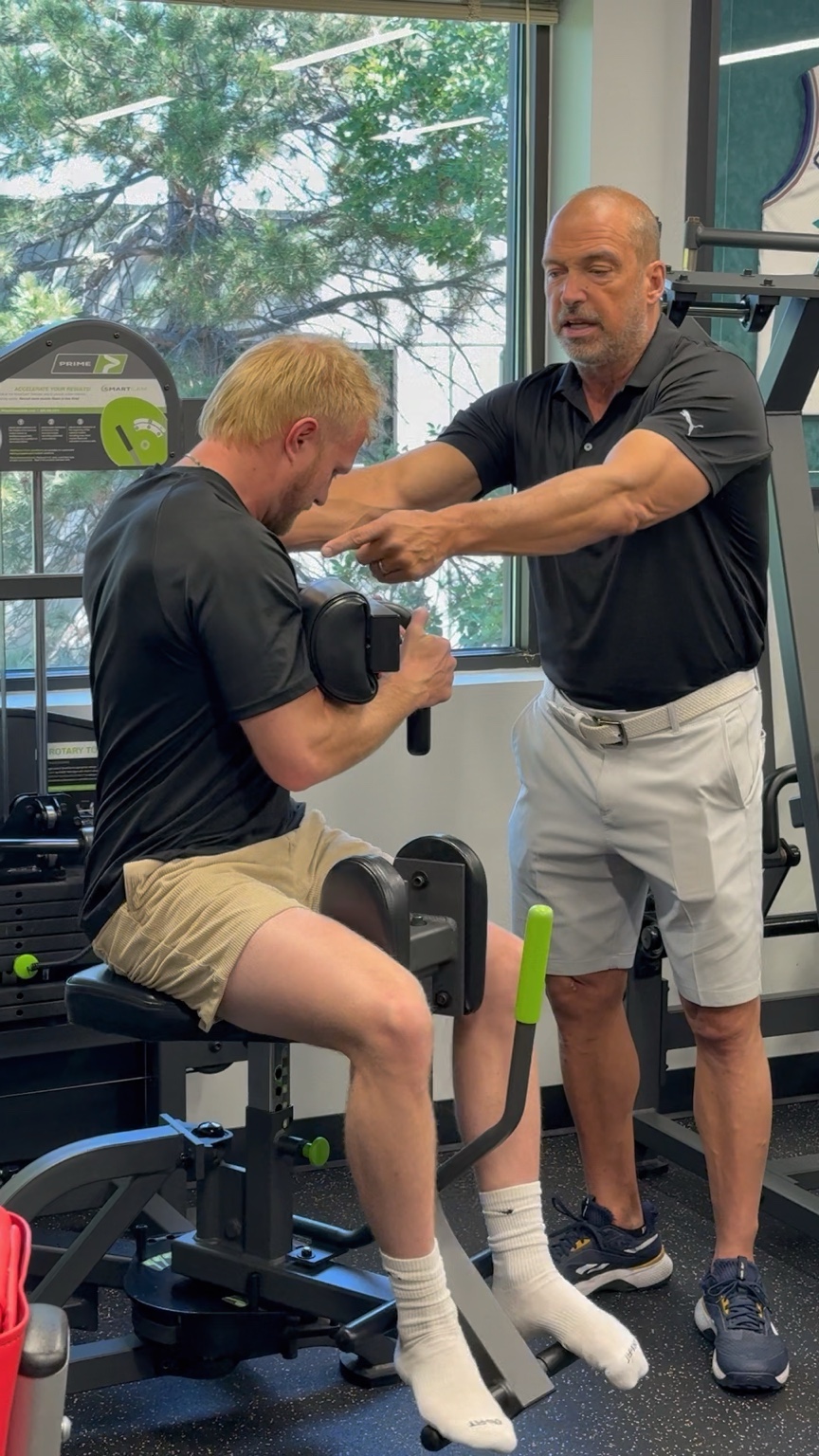 MAT practitioner guiding a client through a movement